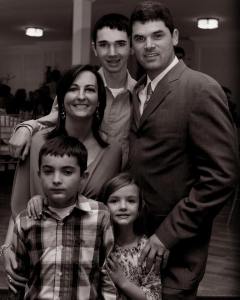 One Strong (and photogenic) Family. Kimber and Scott Strong with their three children.